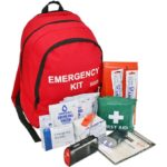 A emergency kit. Also known as a go-bag. In front of the backpack is a number of medical supplies.